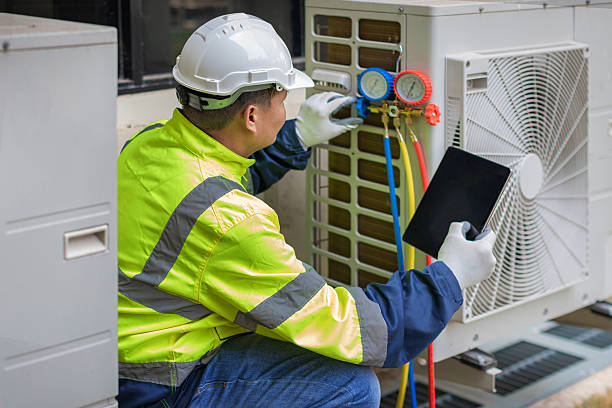 Professional Hvac technician working in College Station, TX